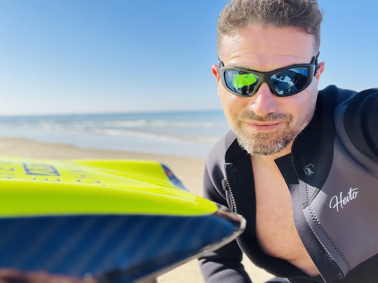 Erez on the beach with his JetSurf board