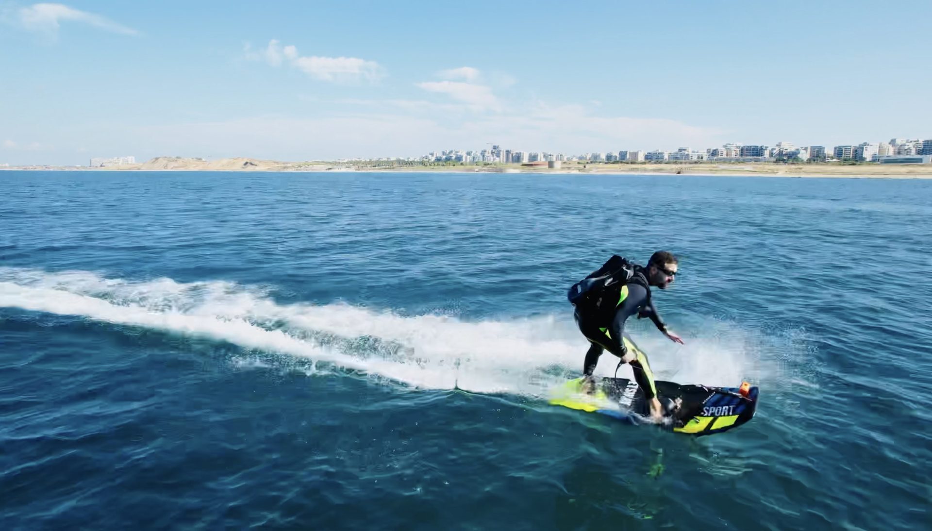 Erez riding a JetSurf board